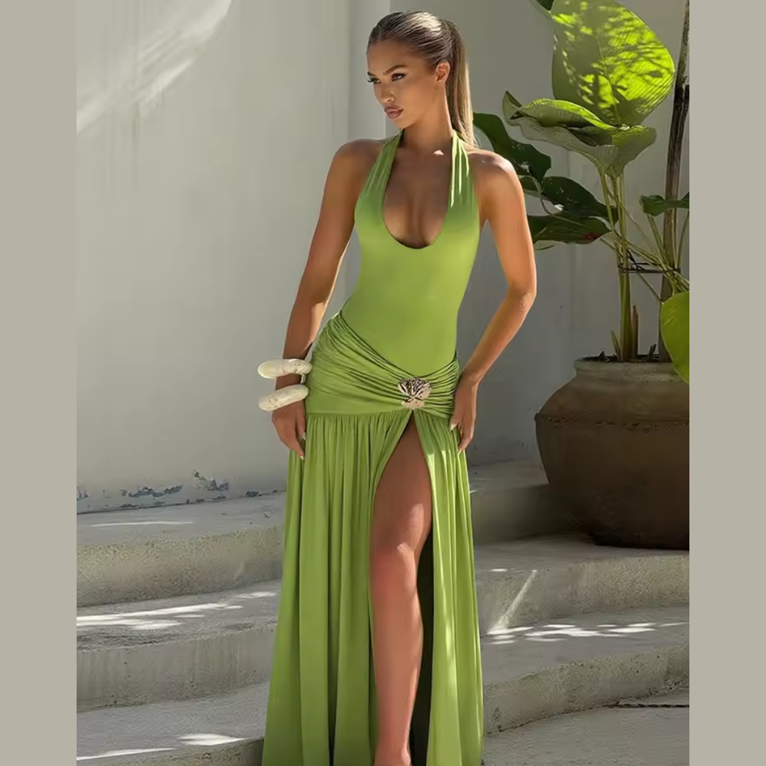 Model wearing olive ruched maxi skirt with orchid brooch and thigh slit – ODI-ONE FASHION