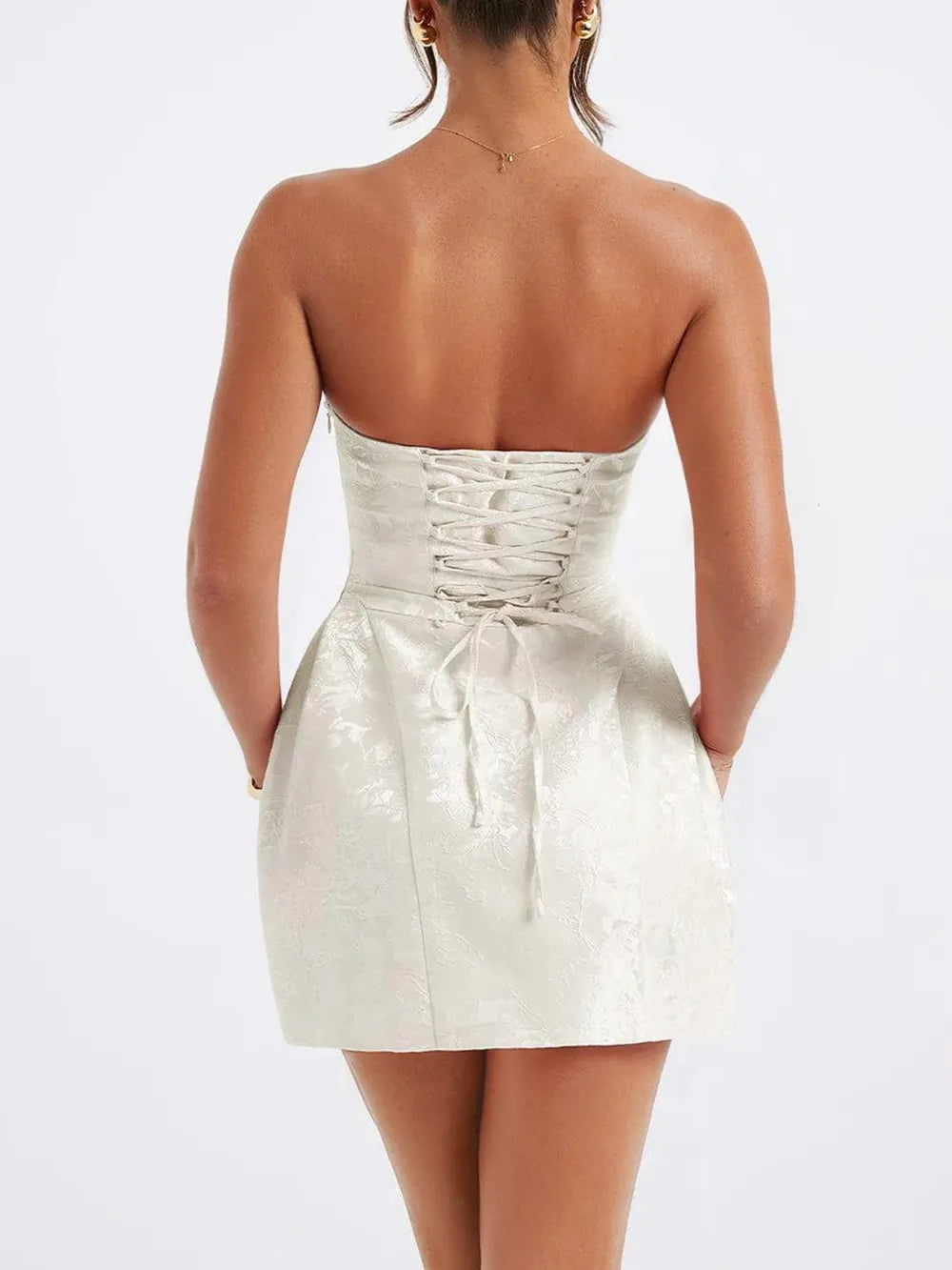 Close-up of satin fabric and bow detail on mini dress Silky Desire Dress