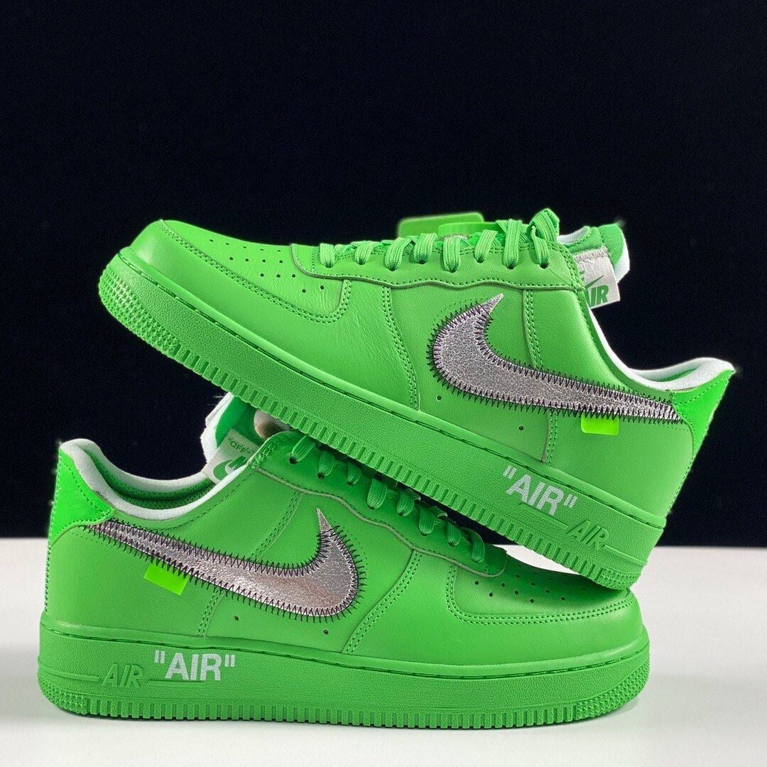 - Off-White Air Force 1 Low sneakers in Light Green Spark and Metallic Silver - side view  
- Limited edition Off-White x Nike Air Force 1 Low for men and women  
