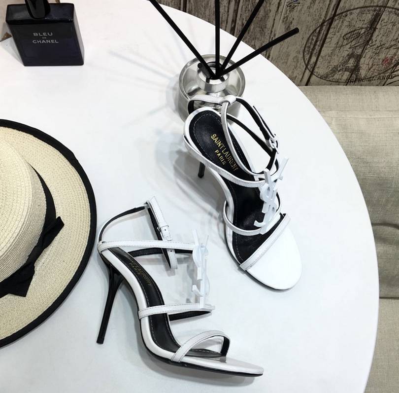 Elegant white heels like YSL runway shoes  