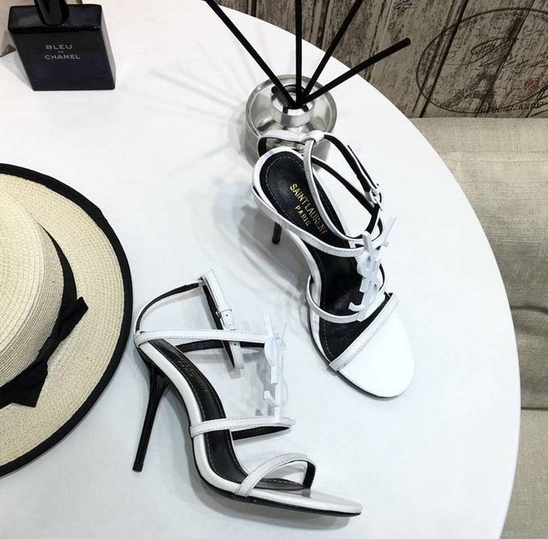 Elegant white heels like YSL runway shoes  