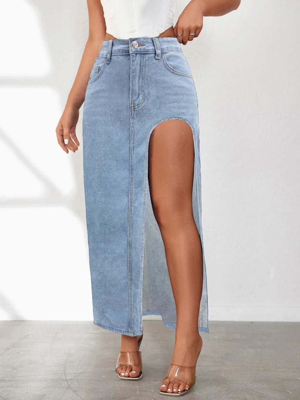 Model wearing high-rise front slit denim skirt – ODI-ONE FASHION
