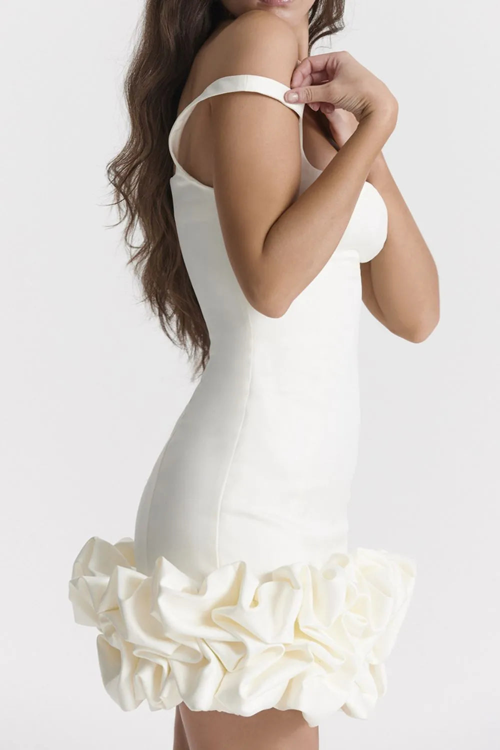 Elegant mini dress with sleeves and body-sculpting fit  