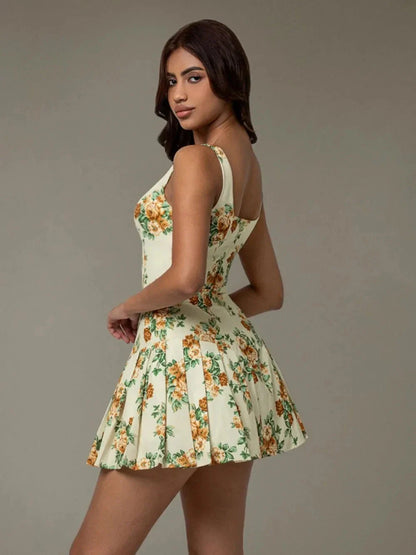 Back design of floral pleated mini dress – lightweight summer fashion for women Blossom Breeze Mini Dress