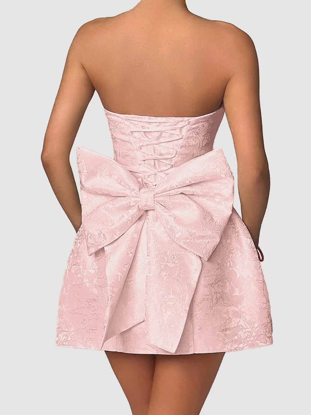Close-up of shiny satin fabric and bow detail Chic Bow Mini
