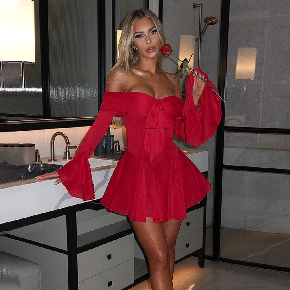 Side angle showing tailored fit of red playsuit 
