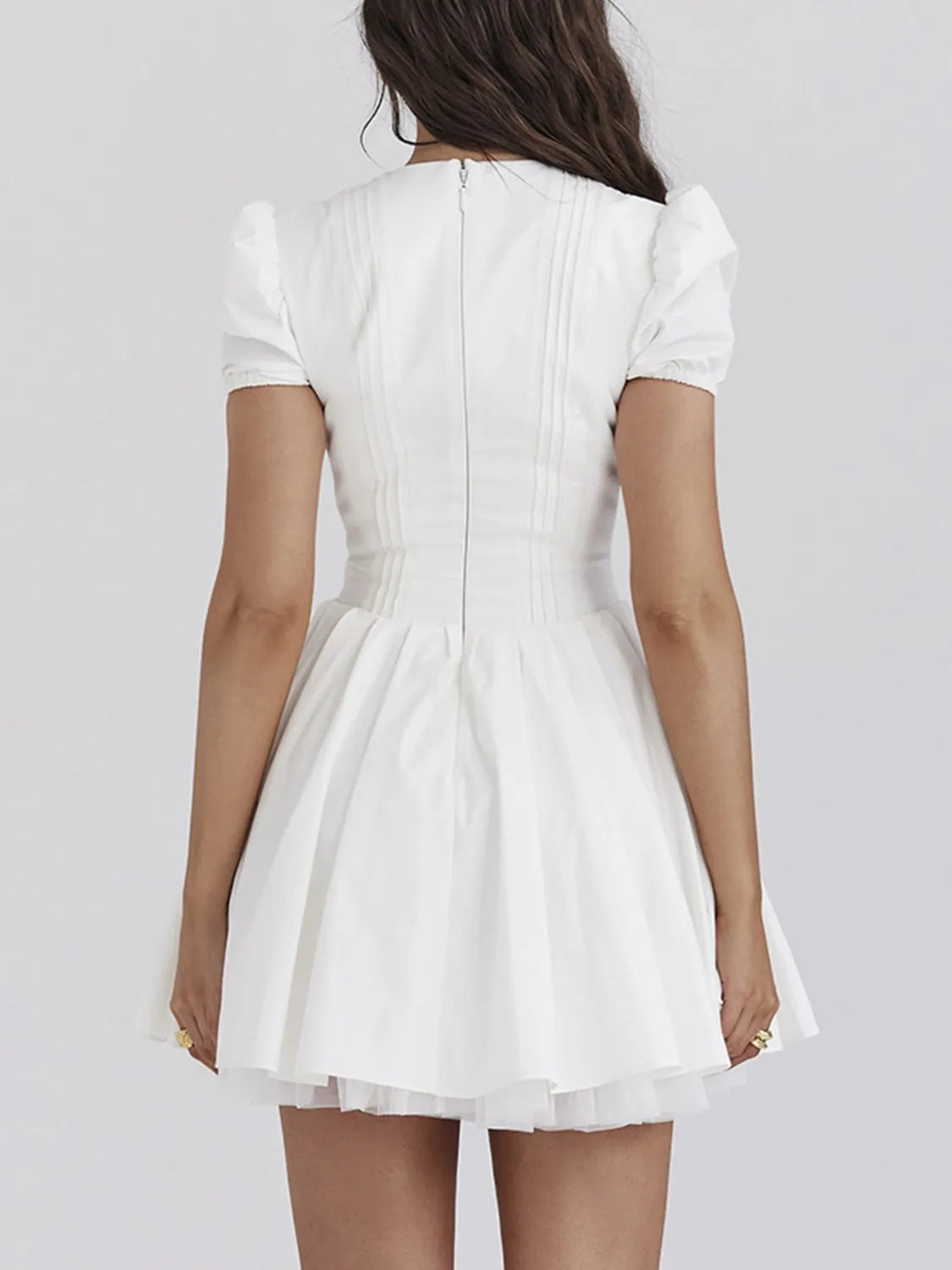 Close-up of soft fabric and V-neck design on casual mini dress Effortless Chic Dress
