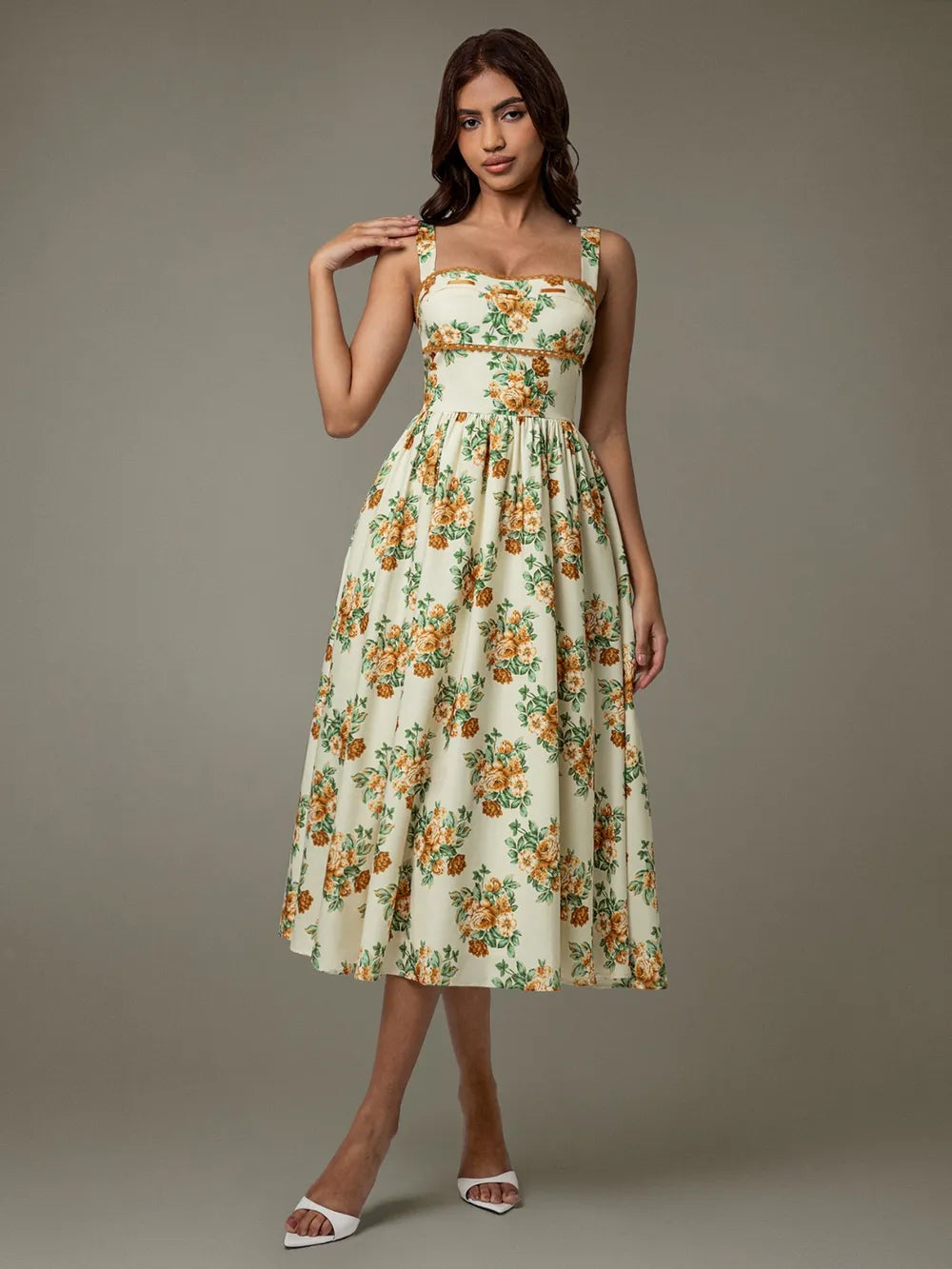 Side profile of sleeveless floral midi dress with lace trim – summer elegance
