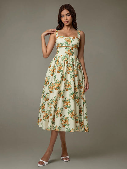 Side profile of sleeveless floral midi dress with lace trim – summer elegance
