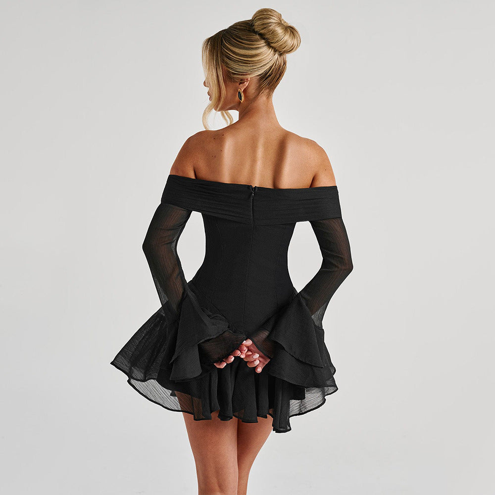 Back view of model in elegant black one-piece outfit