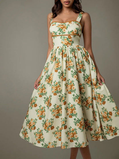 Woman wearing elegant floral lace midi dress – sleeveless summer style
