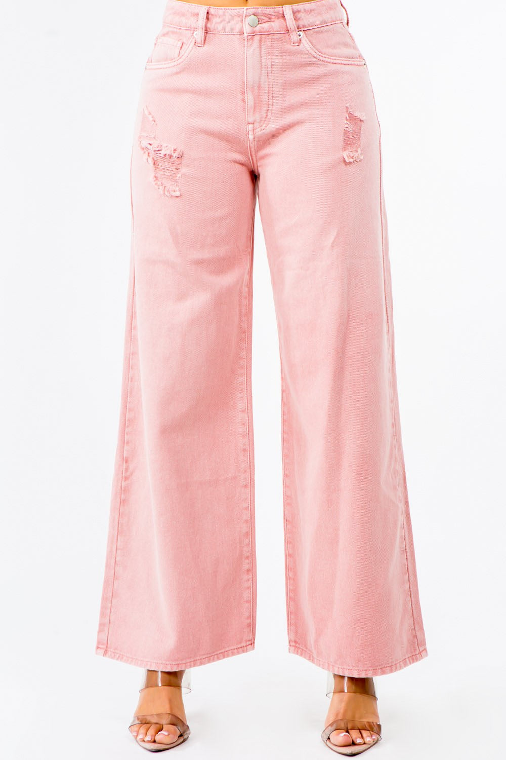 Model wearing high-waisted distressed wide leg jeans – ODI-ONE FASHION street style
