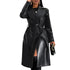 Black leather trench coat worn by a model on a white background
