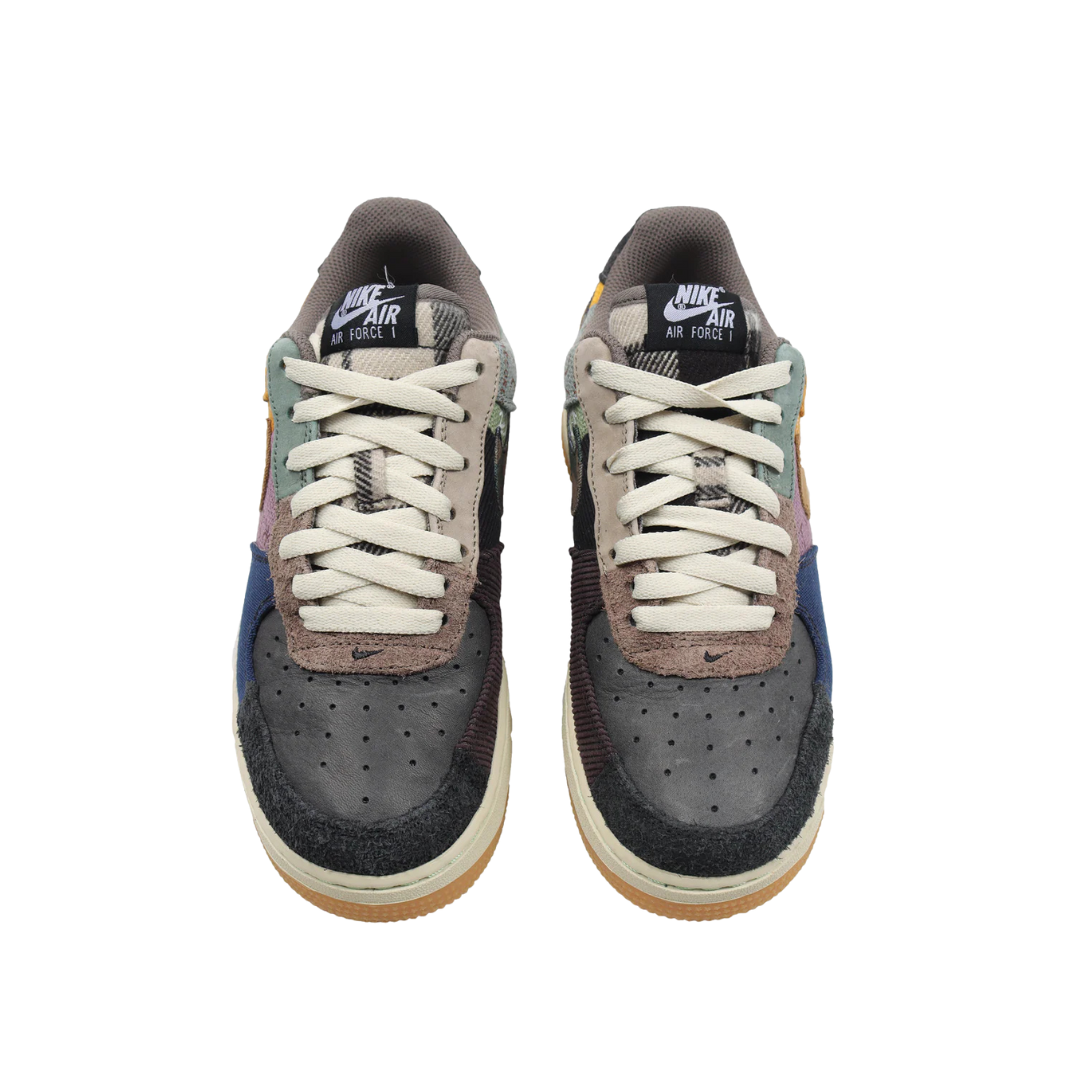 Nike Air Force 1 Low Travis Scott Cactus Jack sneaker side view  
Nike Air Force 1 Low Travis Scott Cactus Jack limited edition shoe top view  
Nike Air Force 1 Low Travis Scott Cactus Jack collab sneaker back view  
Nike Air Force 1 Low Travis Scott Cactus Jack sneakers with gum sole  
Travis Scott x Nike Air Force 1 Low Cactus Jack patchwork design
