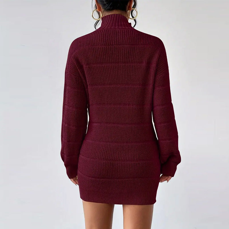 Maroon ribbed sweater dress on a plain background