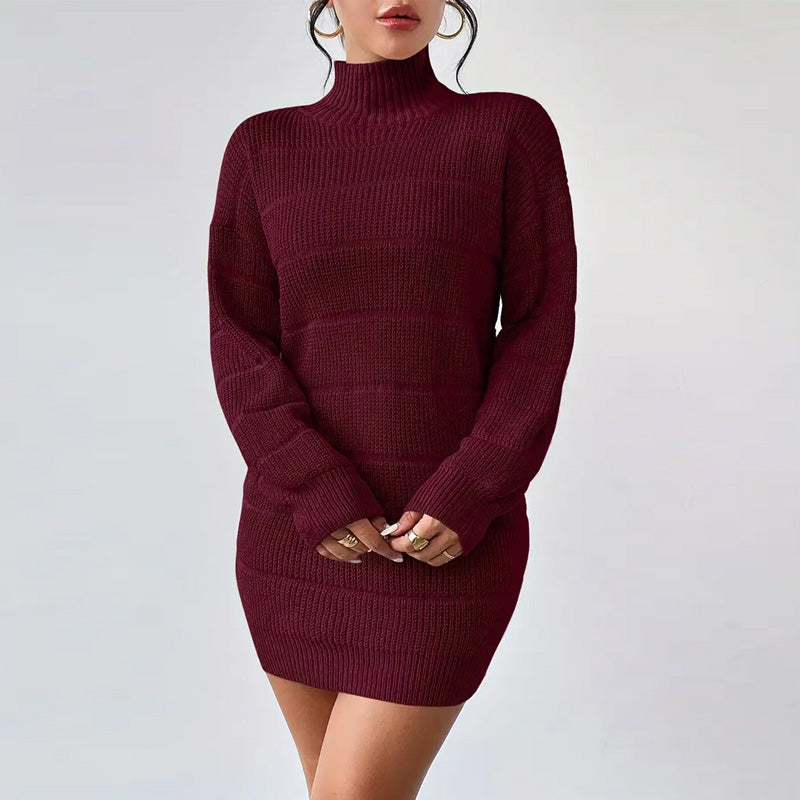 Maroon ribbed sweater dress worn by a model on a light gray background