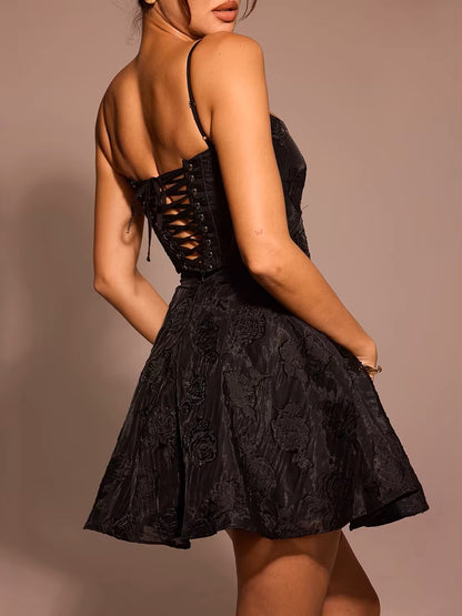 Close-up view of soft lace fabric on a V-neck evening dress