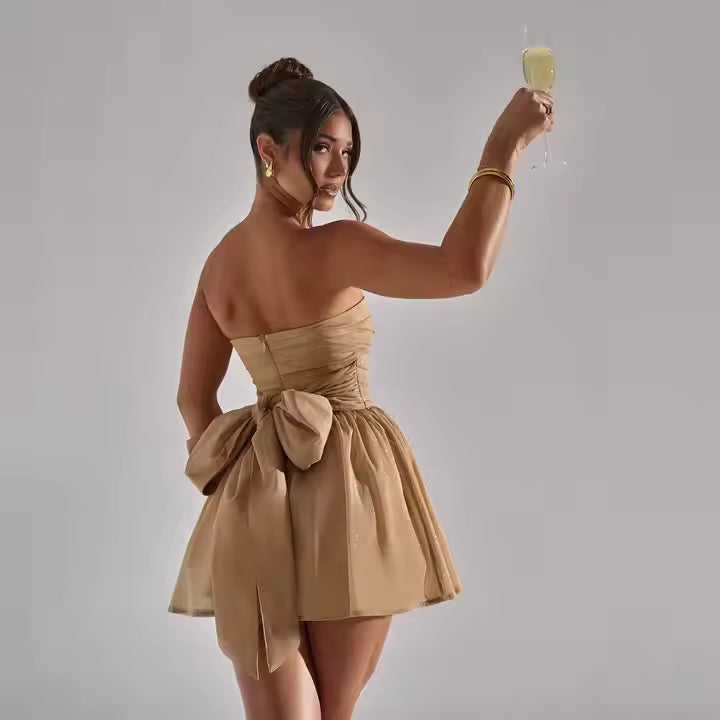 Sarah wearing a summer dress – [Your Brand]

