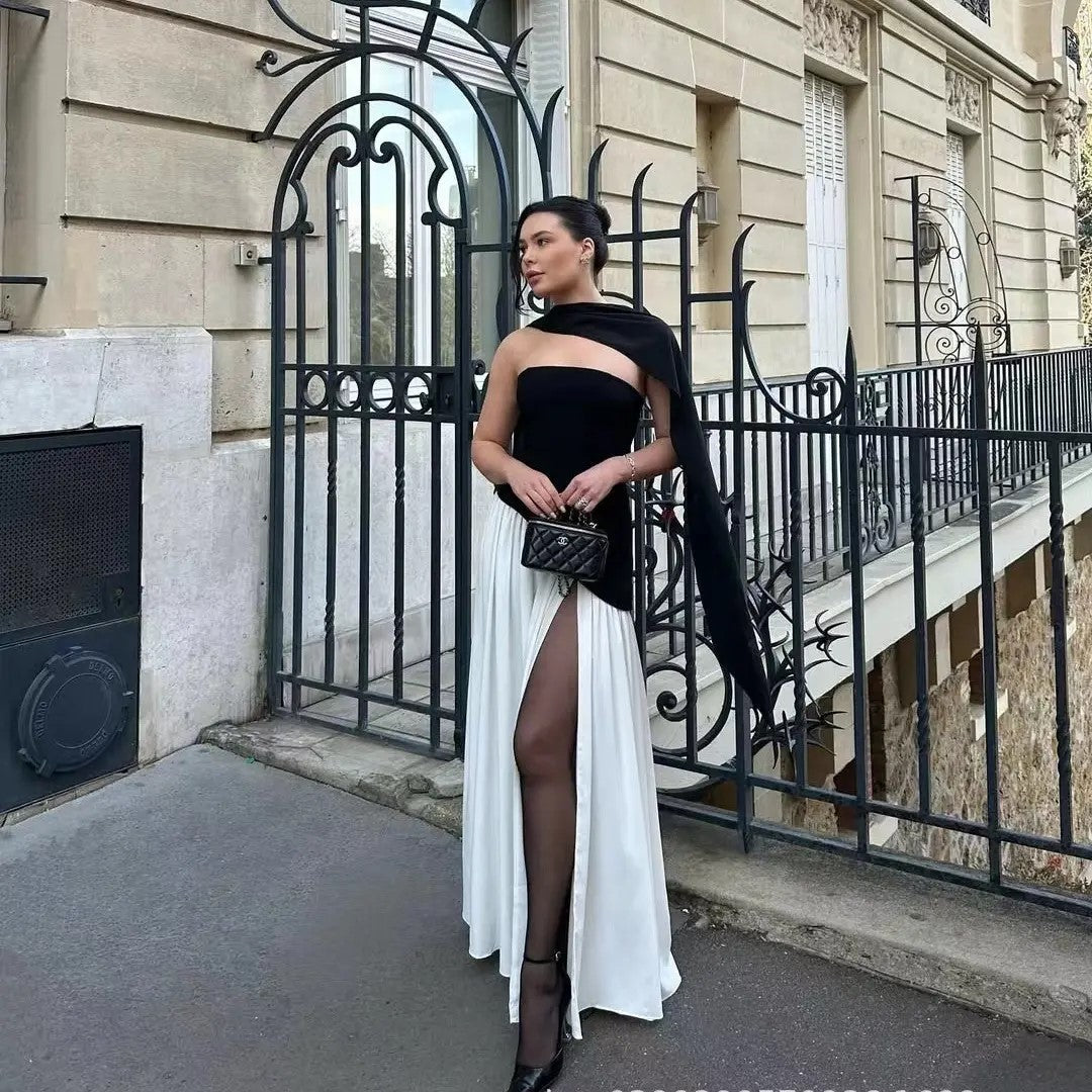 Model wearing strapless prom dress – black and white color block Black & White Strapless