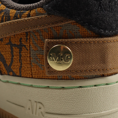 Nike Air Force 1 Low Travis Scott Cactus Jack sneaker side view  
Nike Air Force 1 Low Travis Scott Cactus Jack limited edition shoe top view  
Nike Air Force 1 Low Travis Scott Cactus Jack collab sneaker back view  
Nike Air Force 1 Low Travis Scott Cactus Jack sneakers with gum sole  
Travis Scott x Nike Air Force 1 Low Cactus Jack patchwork design
