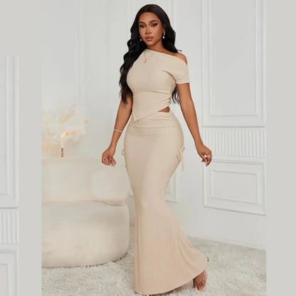 Selena Pleated Mermaid Skirt Set – elegant women’s two-piece outfit
Summer pleated fishtail skirt set with crop top
Chic women’s two-piece summer party outfit – ODI-ONE FASHION
