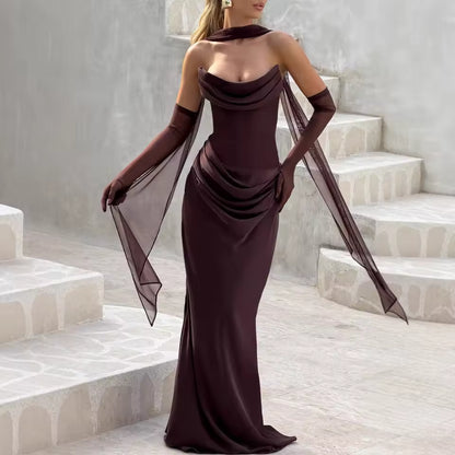 Model wearing Seraphina strapless backless maxi dress with gloves and scarf
