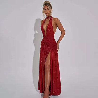 Woman in red glitter evening dress walking confidently

