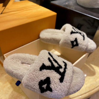 Luxury shearling fur mules for women available in multiple colors and styles