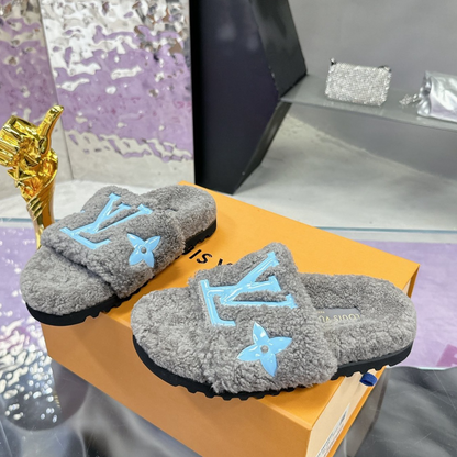 Luxury shearling fur mules for women available in multiple colors and styles
