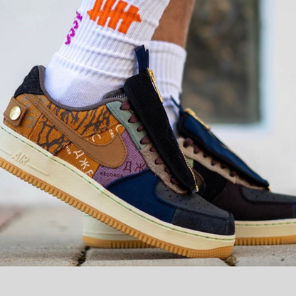 Nike Air Force 1 Low Travis Scott Cactus Jack sneaker side view  
Nike Air Force 1 Low Travis Scott Cactus Jack limited edition shoe top view  
Nike Air Force 1 Low Travis Scott Cactus Jack collab sneaker back view  
Nike Air Force 1 Low Travis Scott Cactus Jack sneakers with gum sole  
Travis Scott x Nike Air Force 1 Low Cactus Jack patchwork design
