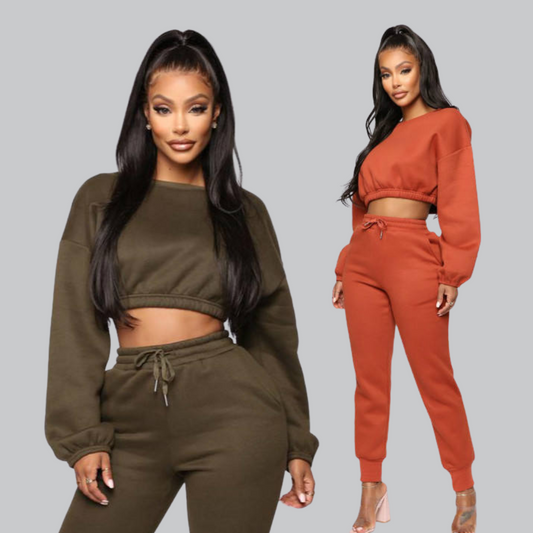 Woman wearing Sofia Orange Oversized Sweatshirt in soft cotton blend.