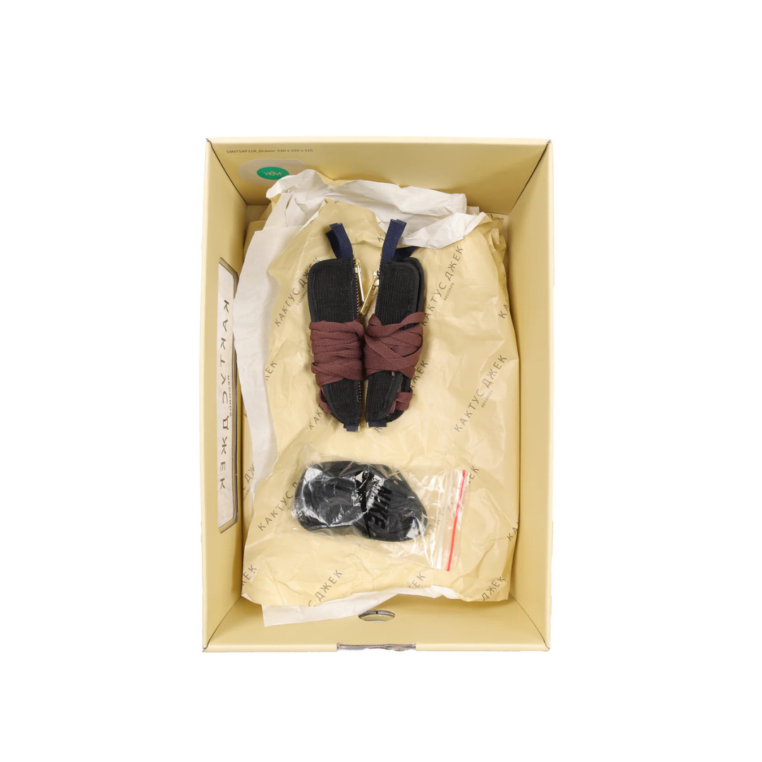 Nike Air Force 1 Low Travis Scott Cactus Jack sneaker side view  
Nike Air Force 1 Low Travis Scott Cactus Jack limited edition shoe top view  
Nike Air Force 1 Low Travis Scott Cactus Jack collab sneaker back view  
Nike Air Force 1 Low Travis Scott Cactus Jack sneakers with gum sole  
Travis Scott x Nike Air Force 1 Low Cactus Jack patchwork design
