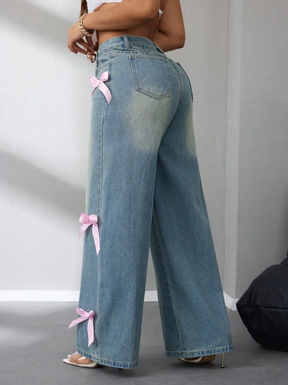 Model wearing high-rise wide leg jeans with bow detail at waist – ODI-ONE FASHION