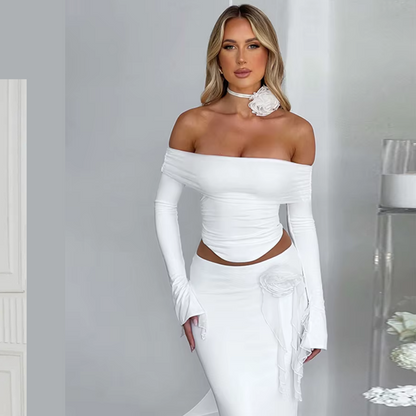 Aria White Two-Piece Set – elegant women’s crop top and skirt outfit
White two-piece set for women – chic summer fashion
Elegant matching white skirt and crop top set – ODI-ONE FASHION
