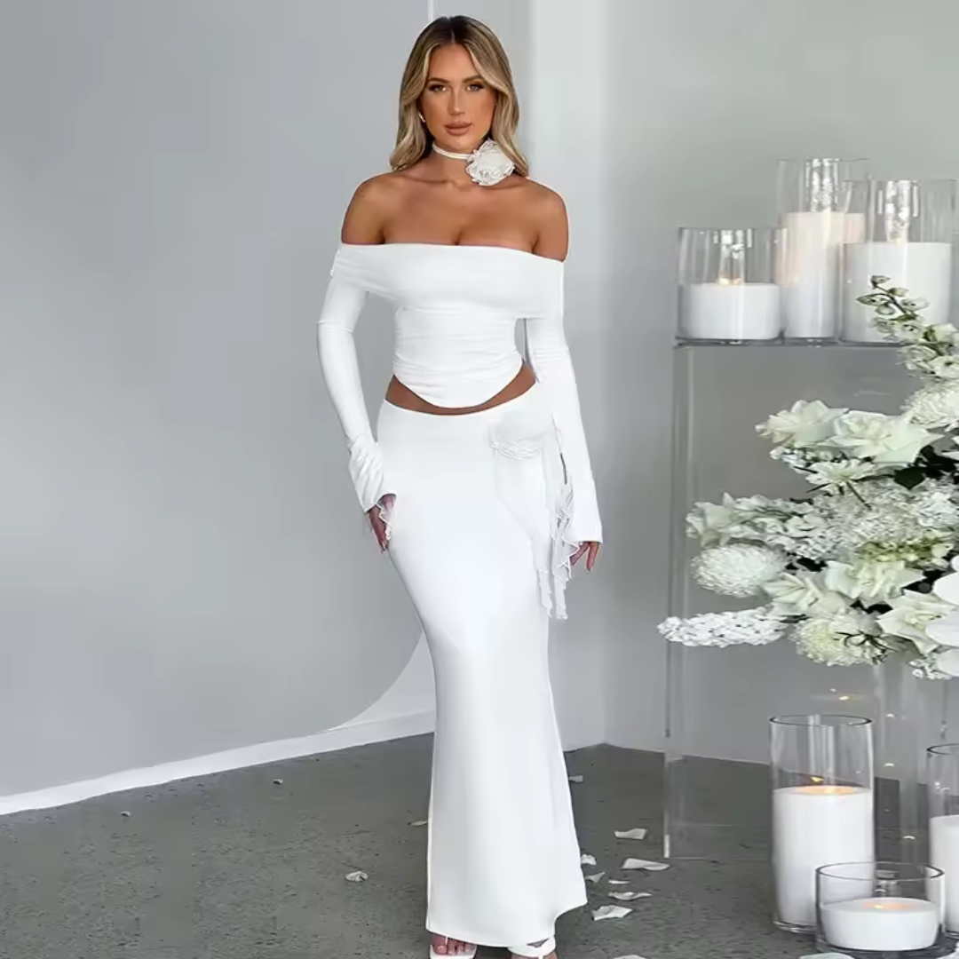 Aria White Two-Piece Set – elegant women’s crop top and skirt outfit
White two-piece set for women – chic summer fashion
Elegant matching white skirt and crop top set – ODI-ONE FASHION
