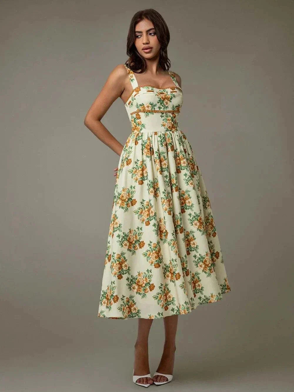 Side profile of sleeveless floral midi dress with lace trim – summer elegance Bow Trim Tube Maxi Dress