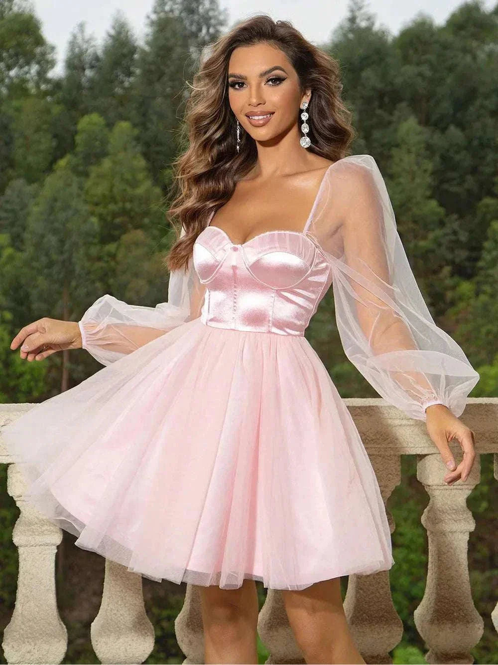 Side profile of mini dress with dramatic balloon sleeves