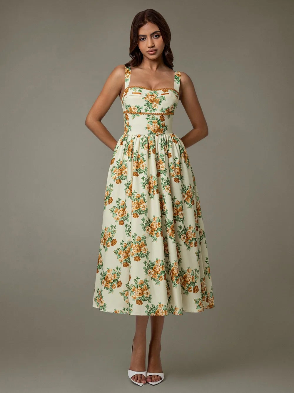 Woman wearing elegant floral lace midi dress – sleeveless summer style
