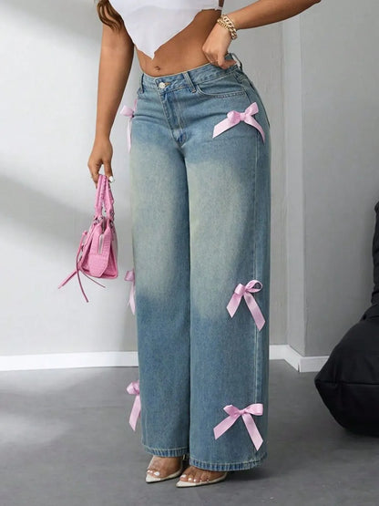 Model wearing high-rise wide leg jeans with bow detail at waist – ODI-ONE FASHION
