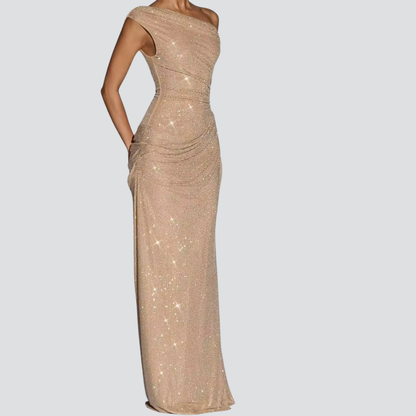 Elegant gold maxi dress showcasing a stunning floor-length silhouette with contemporary style and sparkle.