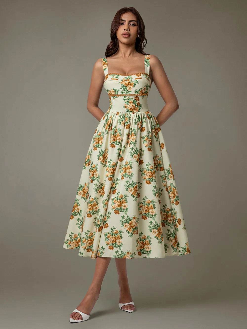 Woman wearing elegant floral lace midi dress – sleeveless summer style
