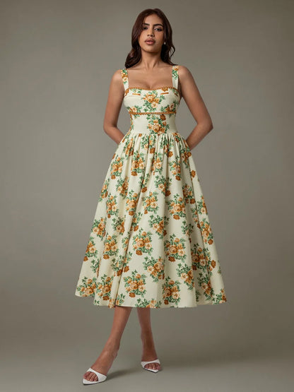 Woman wearing elegant floral lace midi dress – sleeveless summer style
