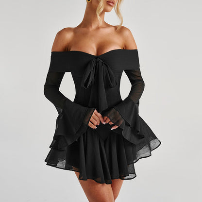 Woman wearing Aria Black tailored playsuit – front view