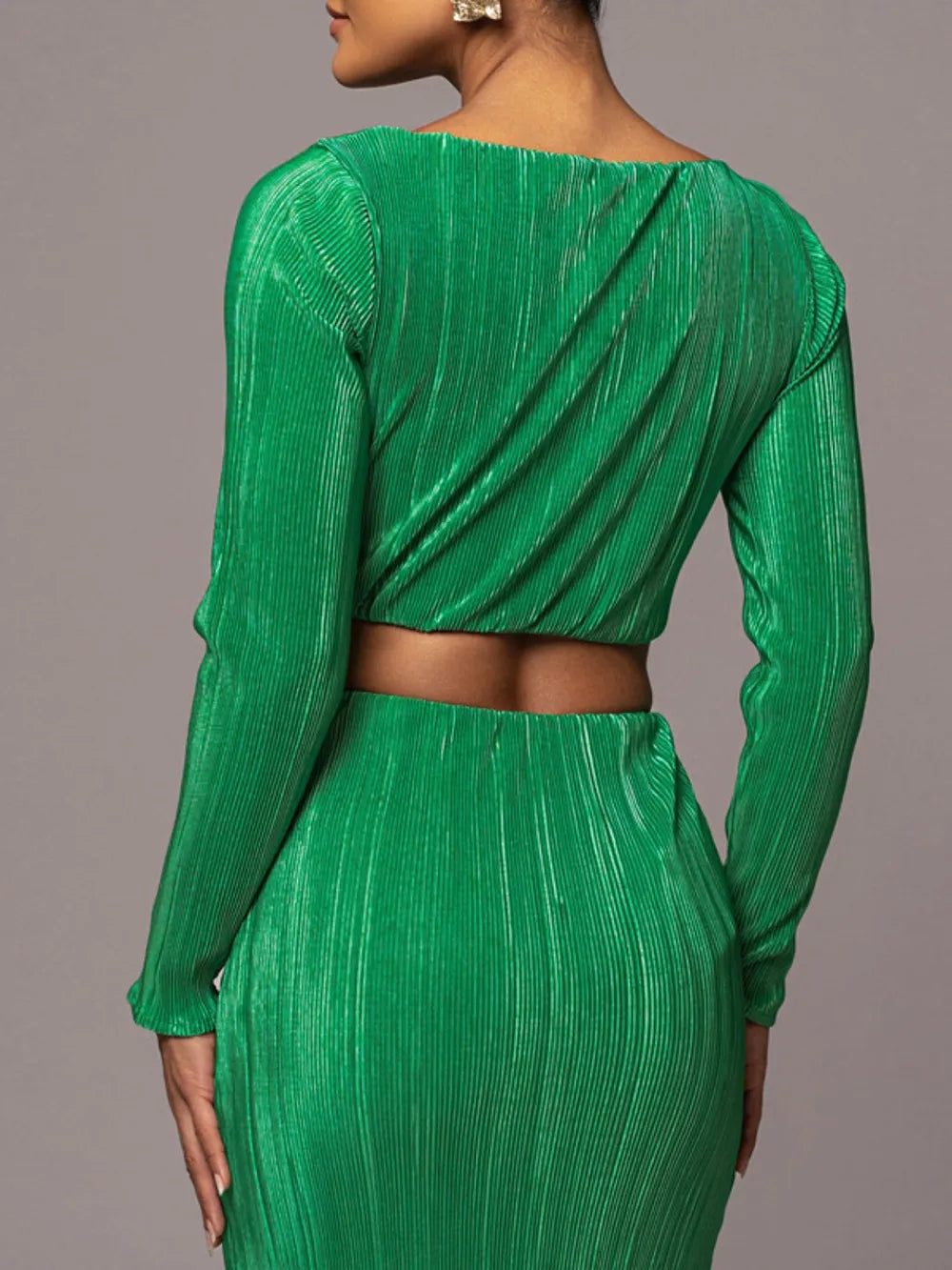 Close-up of ruched cowl neck and flowy skirt details"