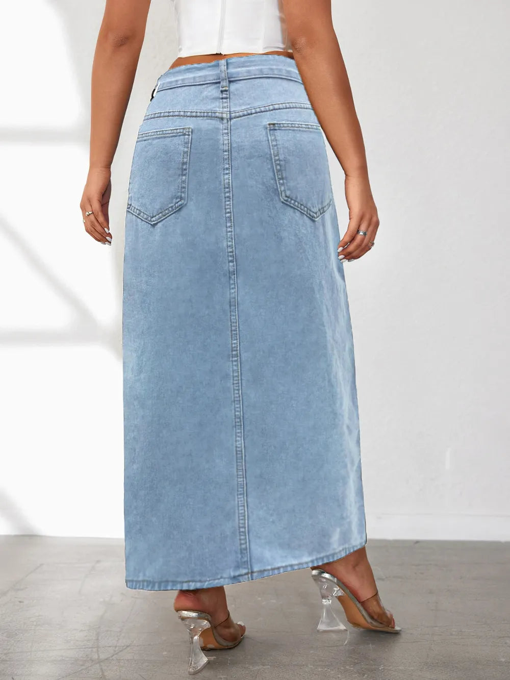 Model wearing high-rise front slit denim skirt – ODI-ONE FASHION
