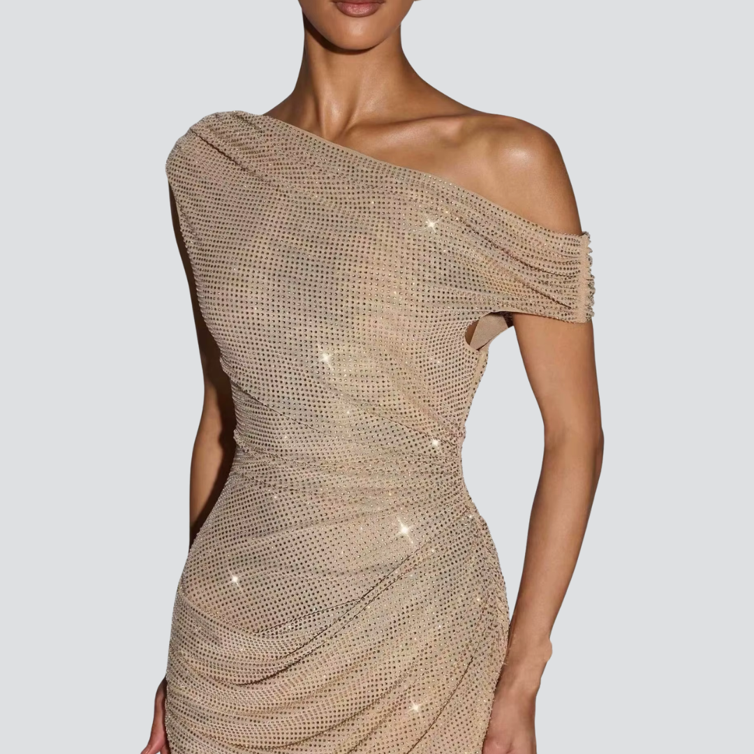 Elegant gold maxi dress showcasing a sophisticated one-shoulder design with shimmering details and flattering silhouette.
