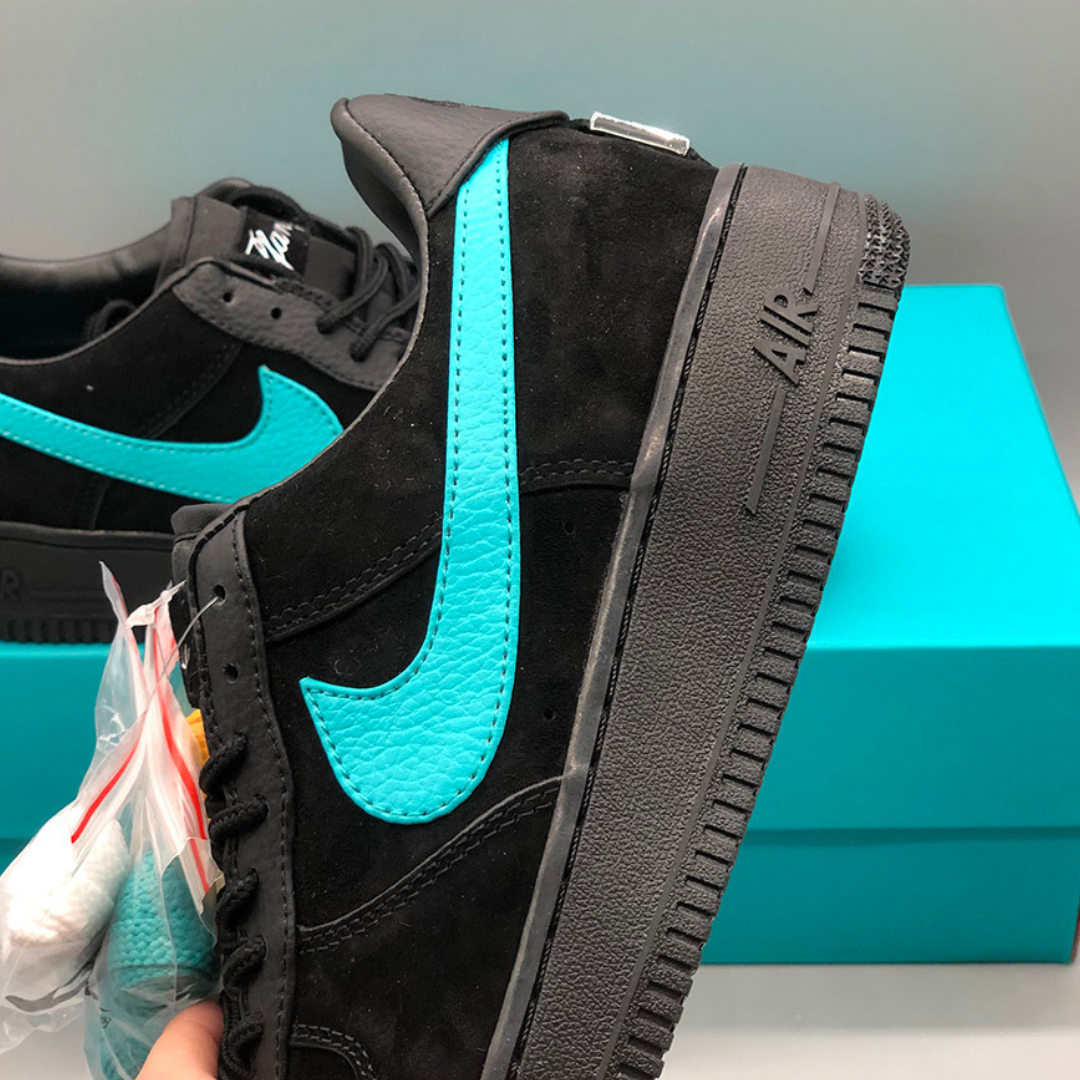alt="Nike Air Force 1 Low Tiffany &amp; Co. 1837 Black Blue DZ1382-001 Sneakers Side View"
alt="Nike Air Force 1 Tiffany &amp; Co. Black Blue Limited Edition Luxury Sneakers"
alt="Nike Tiffany Air Force 1 1837 Black Blue Premium Suede Leather Design"
alt="Nike Air Force 1 Tiffany &amp; Co. Sneakers with Tiffany Blue Accents"
