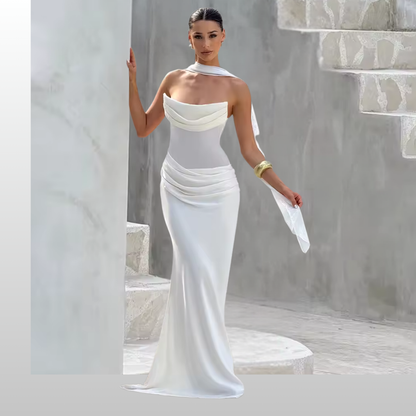 Model wearing Seraphina white strapless backless maxi dress with gloves and scarf
