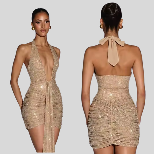 Gold sequin dress shown from front and back on a model against a gray background